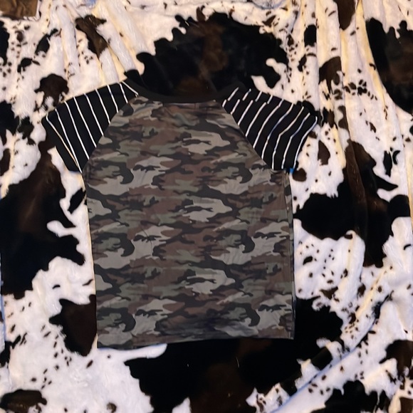 a camouflage and black and white striped shirt - Picture 2 of 3